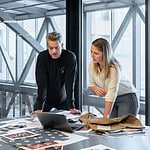 Business owner meeting with an SEO company to review a proposal