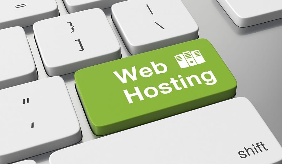 keyboard with green enter key text web hosting